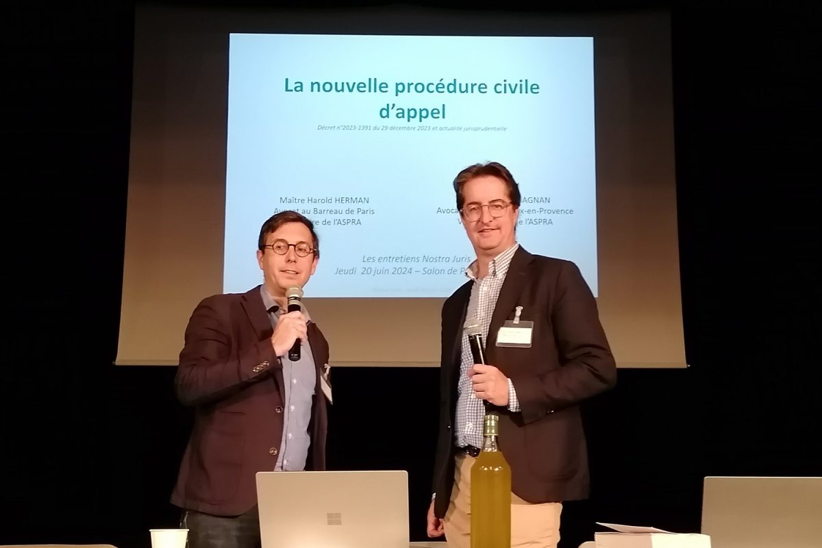 Young business couple make a deal and shake hands